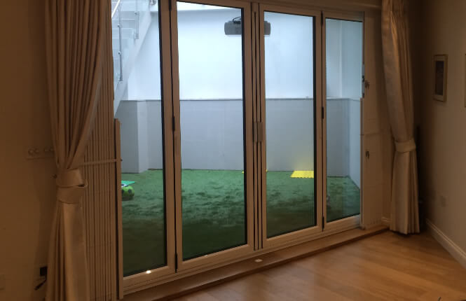 Opened RSG1000 retractable grille on a residential door in central London.