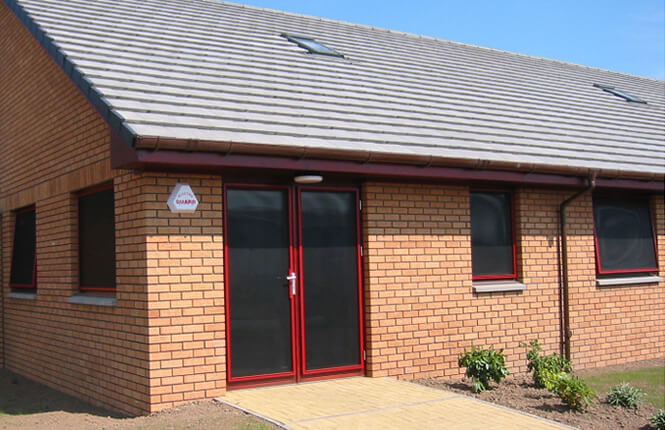 RSG2200 security shields on retail shop front in Islington.