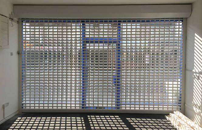 RSG5600 shop front roller shutter installed on a new shop in Hackney.