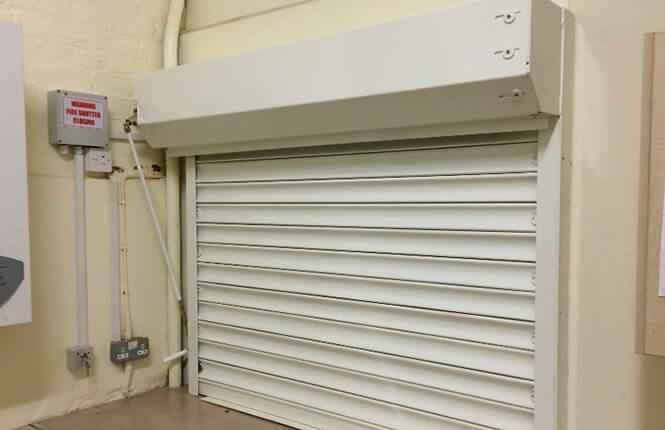 RSG5700 opened fire shutter fitted to the kitchen area inside a London commercial outlet.