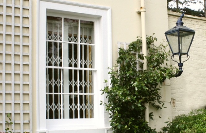 RSG1200 LPS1175 collapsible window grille on home in South London.