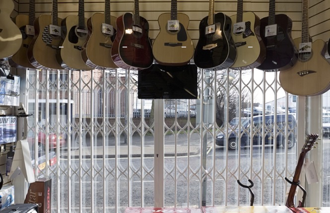 RSG1200 LPS1175 grille securing shop front in Derby.