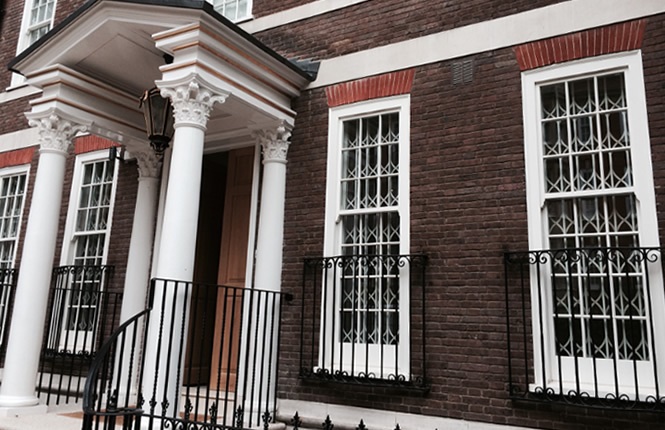 RSG1200 LPS1175 collapsible security grilles protecting residential windows in Hammersmith and Chelsea London.