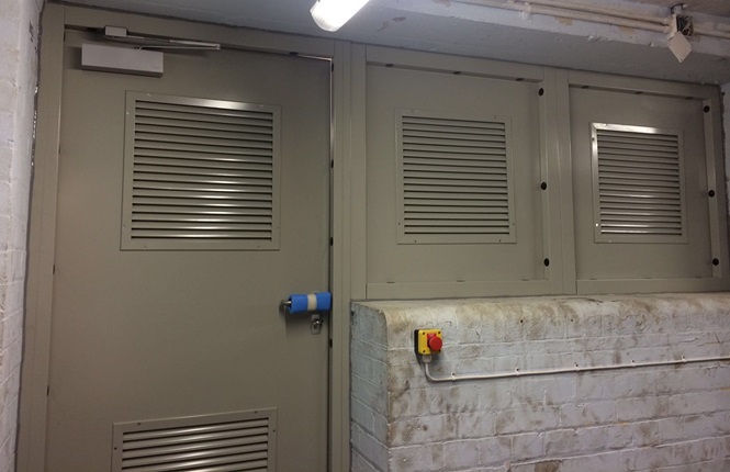 RSG8200-FR240 fire rated louvre doorset with side panels fitted to Vicars Green Primary School, Wembley.