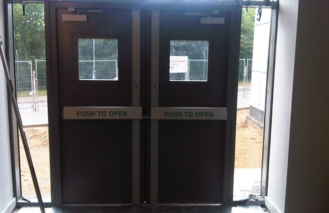 RSG9300 LPS1175 SR3 fire exit pair of security doors on a London Police Station.